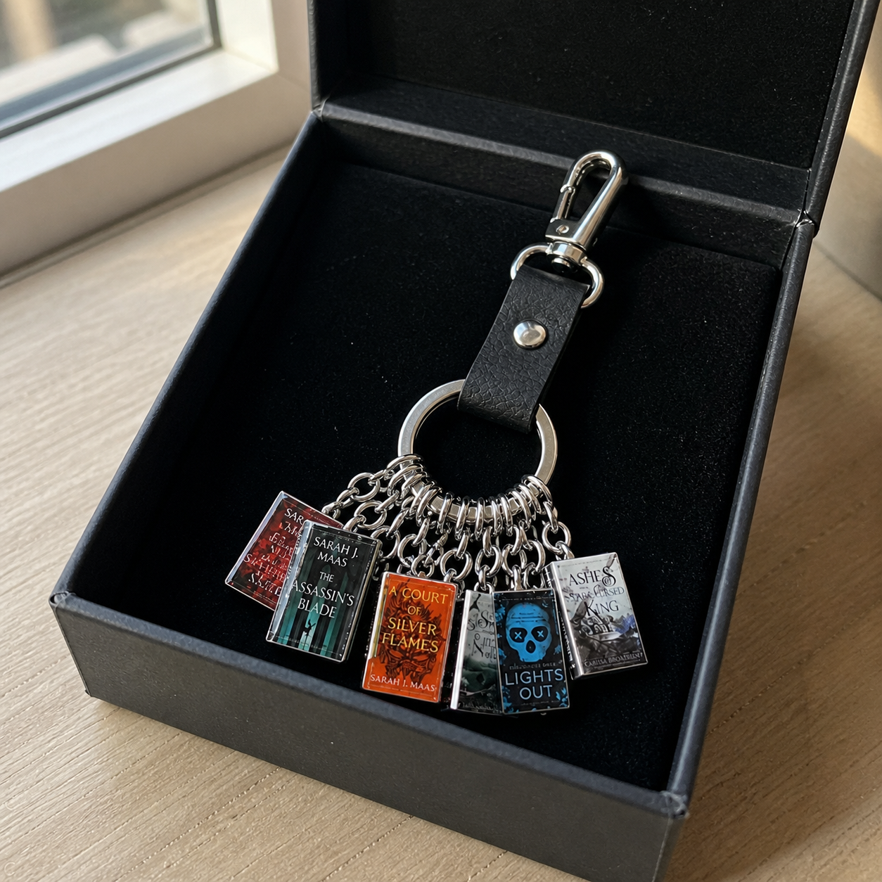 Custom-designed mini-book keychains, personalized bag charms for book lovers, and perfect gifts for readers, librarians, teachers, and graduates.