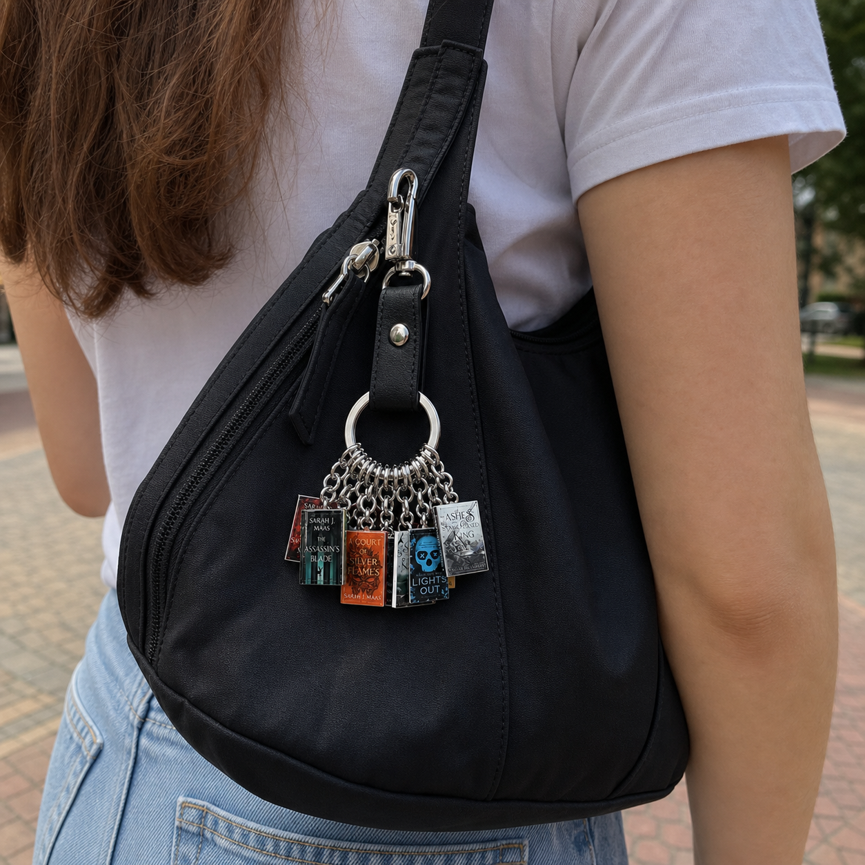 Custom-designed mini-book keychains, personalized bag charms for book lovers, and perfect gifts for readers, librarians, teachers, and graduates.